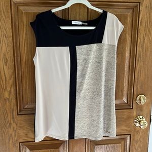 Women’s multi color top by Calvin Klein.